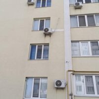 Реставрація фасаду багатоповерхового будинку в Миколаєві