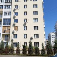 Реставрація фасаду багатоповерхового будинку в Миколаєві