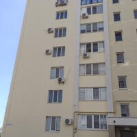 Реставрація фасаду багатоповерхового будинку в Миколаєві