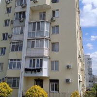 Реставрація фасаду багатоповерхового будинку в Миколаєві
